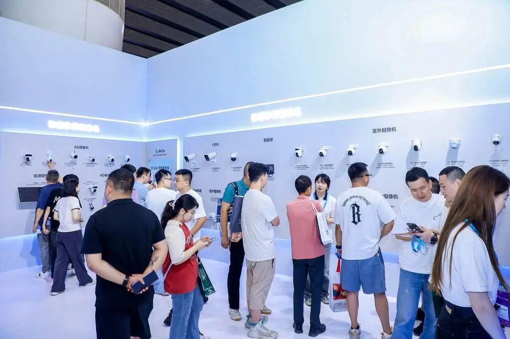The camera product wall in the EZVIZ exhibition area, from Y-series indoor models to smart dome and outdoor cameras