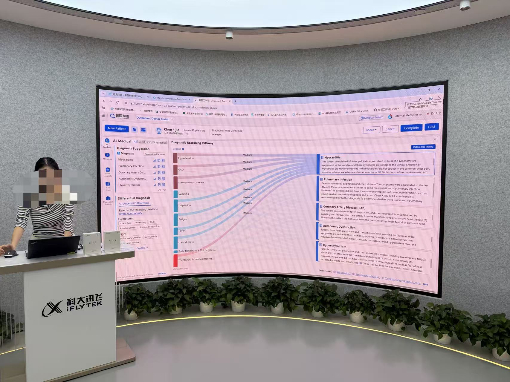 A presenter demonstrating iFLYTEK's AI medical assistant on a curved screen inside the exhibition hall